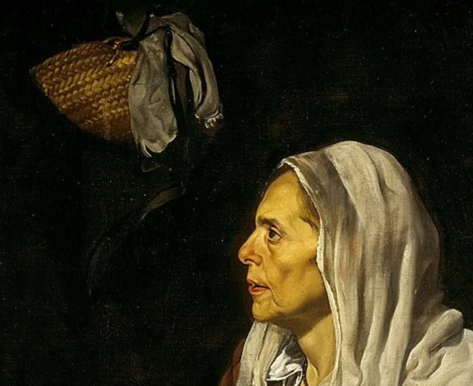 Old woman frying eggs basket