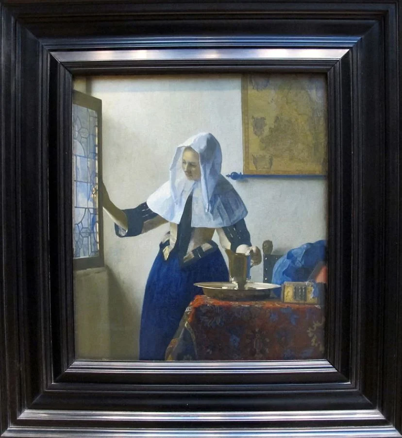 Woman with a water jug by Johannes Vermeer