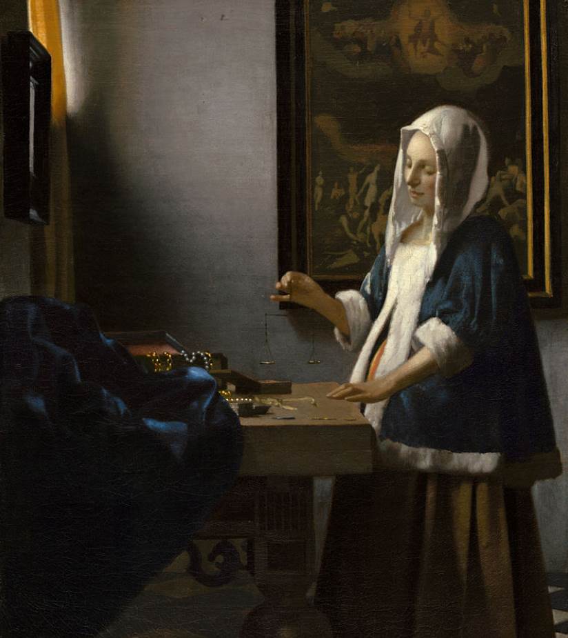 Woman Holding a balance full painting