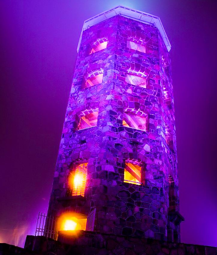 Enger tower lit up purple