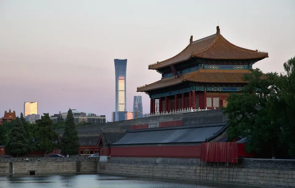 Forbidden City and modern skyscrapers