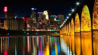 Stone Arch Bridge and downtown Minneapolis at night