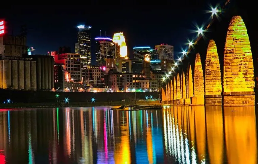 Stone Arch Bridge and downtown Minneapolis at night