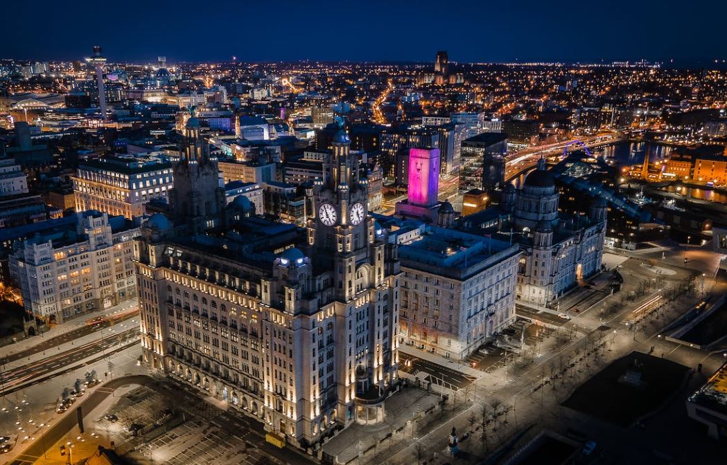 Three Graces aerial view at night